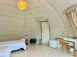 Ein Bett oder Betten in einem Zimmer der Unterkunft SORANIWA glamping
