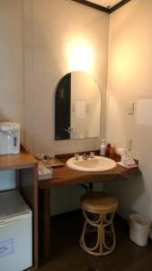 Ein Badezimmer in der Unterkunft 白水温泉竹の倉山荘