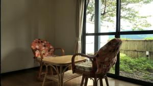 Ein Balkon oder eine Terrasse in der Unterkunft 白水温泉竹の倉山荘