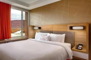 Postelja oz. postelje v sobi nastanitve SpringHill Suites by Marriott Moab