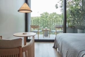 TRUNK(HOTEL) YOYOGI PARK客房内的一张或多张床位
