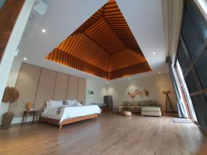 Voodi või voodid majutusasutuse Ream YoHo Resort toas