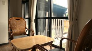 Ein Balkon oder eine Terrasse in der Unterkunft 白水温泉竹の倉山荘