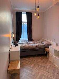 Postel nebo postele na pokoji v ubytování 1 or 2 bedrooms Panorama Skien Lux Retreat + 66 fotografií