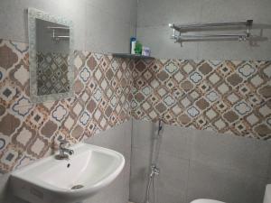 Koupelna v ubytování Mansons Homestay + 14 fotografií