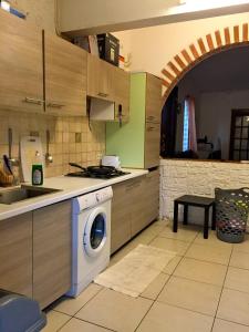 Kuchyň nebo kuchyňský kout v ubytování Villa 1962