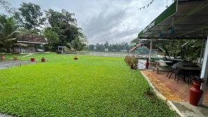 Zahrada ubytování River View Resort by Periyar Ayurveda