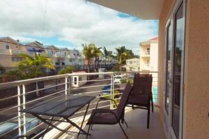 弗利康弗拉克Le Palmier 3 beds summer vacation private furnished apartment with pool near beach flic en flac的相册照片