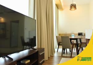 TV a/nebo společenská místnost v ubytování MARZON HOTEL KALIBO