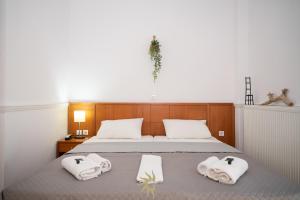 Postel nebo postele na pokoji v ubytování Galini Hotel