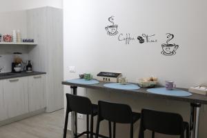 Kuchyň nebo kuchyňský kout v ubytování Bed and Breakfast 3 Medaglie
