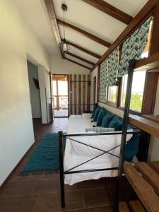 a room with two beds and a couch at Guest House Kalina,Studio 1 in Ammouliani