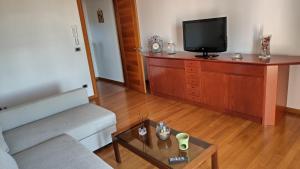 TV a/nebo společenská místnost v ubytování Casa vacanze