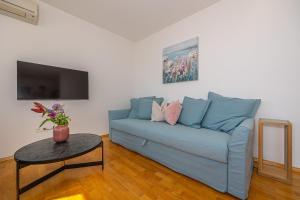 Televízia a/alebo spoločenská miestnosť v ubytovaní Lorelai - Apartment with private Swimmingpool