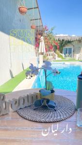 Bazén v ubytování استراحة دسمان nebo v jeho okolí