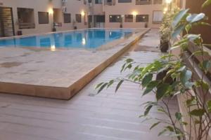 Πισίνα στο ή κοντά στο appartement de luxe gueliz