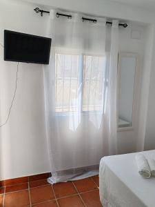 TV a/nebo společenská místnost v ubytování Casa Cabo de Gata