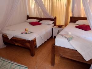 Voodi või voodid majutusasutuse fullesguesthouse toas