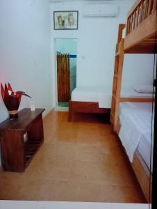 Voodi või voodid majutusasutuse fullesguesthouse toas