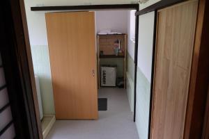 Eldhús eða eldhúskrókur á Guest House Kurukuru ゲストハウスくるくる