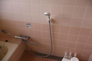 Baðherbergi á Guest House Kurukuru ゲストハウスくるくる