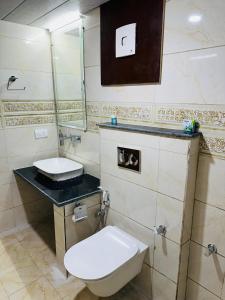 Koupelna v ubytování Hotel Vishranti