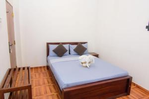 Postel nebo postele na pokoji v ubytování Sholay Villa
