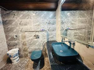 Koupelna v ubytování Hotel Vishranti