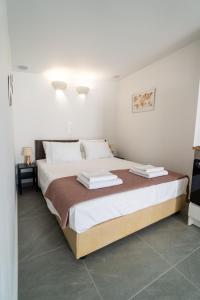 Ένα ή περισσότερα κρεβάτια σε δωμάτιο στο Best4U Beachside Studio for 2 pax