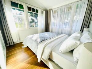 Ein Bett oder Betten in einem Zimmer der Unterkunft SPR house Chatswood - 3 bedrooms -2