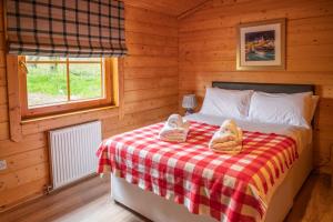 Postel nebo postele na pokoji v ubytování Saplinbrae Hotel and Lodges