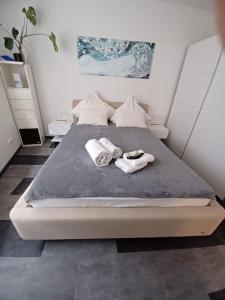 Ένα ή περισσότερα κρεβάτια σε δωμάτιο στο Zentral - mitten in der Altstadt