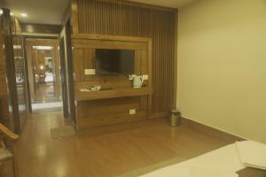 TV a/nebo společenská místnost v ubytování Hotel Vishranti