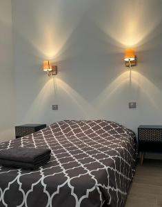 Ένα ή περισσότερα κρεβάτια σε δωμάτιο στο Villa moderne en campagne avec piscine +13 φωτογραφίες