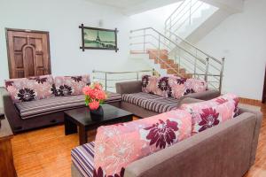 Posezení v ubytování Sholay Villa