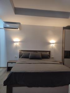 Postel nebo postele na pokoji v ubytování Guest House Nakjoski