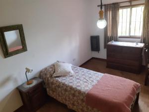 Postel nebo postele na pokoji v ubytování Hostel Lilia, Ezeiza airport, Hospital Bicentenario Monte Grande