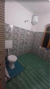 Ένα μπάνιο στο Tspn GUEST HoUsE