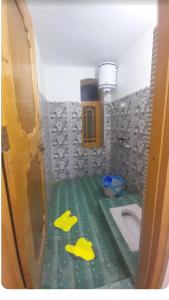 Ένα μπάνιο στο Tspn GUEST HoUsE