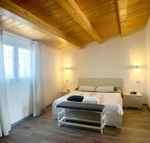 Postel nebo postele na pokoji v ubytování Una Vita In Vacanza