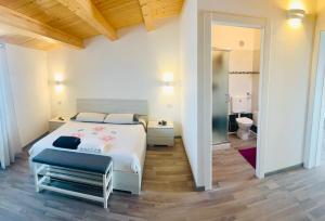 Postel nebo postele na pokoji v ubytování Una Vita In Vacanza