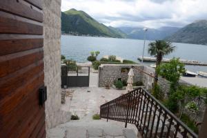 a view of a lake from a house at Lazovic- Apartment by the Sea with Amazing View in Dobrota