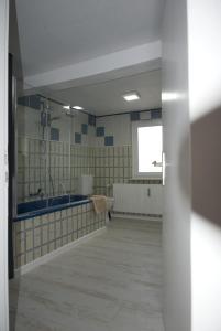 Ένα μπάνιο στο Ferienwohnung Frieda