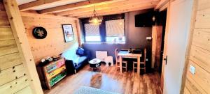 TV a/nebo společenská místnost v ubytování Studio type chalet