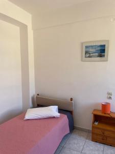Postel nebo postele na pokoji v ubytování Tasos Manaritsas Rooms