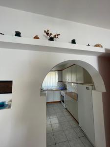 Kuchyň nebo kuchyňský kout v ubytování Tasos Manaritsas Rooms