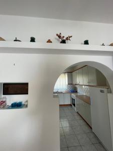 Kuchyň nebo kuchyňský kout v ubytování Tasos Manaritsas Rooms