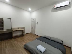 En eller flere senge i et værelse på VI Homelite Eco Park + 13 billeder