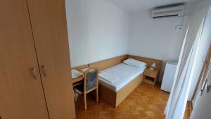 Katil atau katil-katil dalam bilik di Apartments and Rooms Mamić