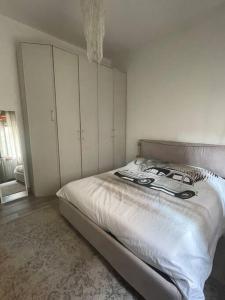 Postel nebo postele na pokoji v ubytování HOUSE MINOU' Lake Como